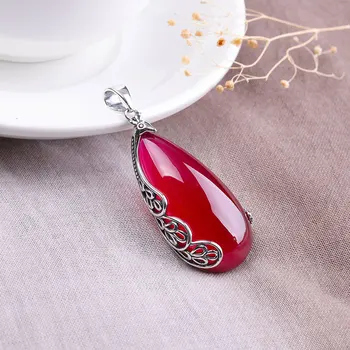 

Character silver items S925 pure silver ornaments Thai silver ms peacock teardrop-shaped red corundum pendant