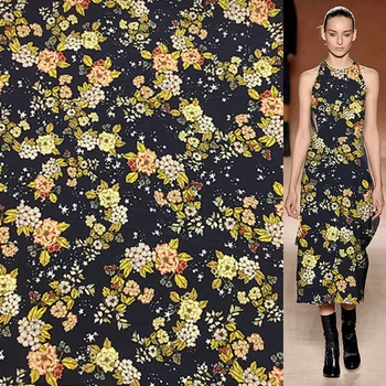 

Yellow floral and star print on black bottom silk crepe de chine fabric,SCDC1081