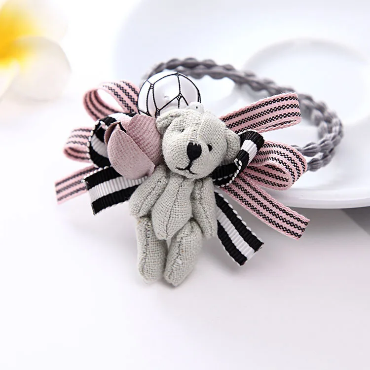 

Creative Korean version of the new children's bear headband fabric flower cartoon bow hair rope wholesale Children cloth Cartoon