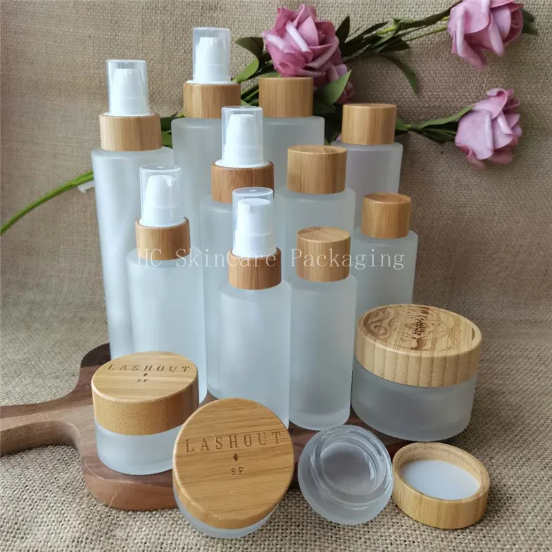 

Custom Logo Matte Glass Empty Bottles and Jars 30/50/100/120/150ml Natrual Bamboo Cap Lotion Bottles Bulk Cosmetic Container