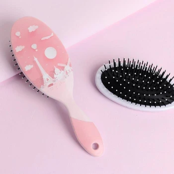 

Massage comb, color pale pink