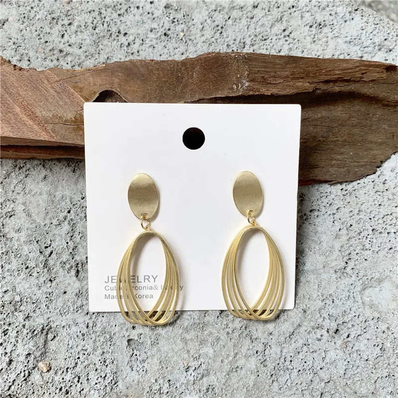 Модные преувеличенный матовое золото серьги из полотого металла контракт