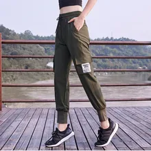 Женский спортивный для бега Штаны свободные брюки для упражнений фитнес для пробежки тренировки брюки для улицы Повседневный карман