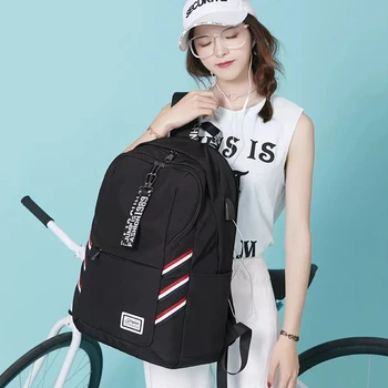 

Large-capacity backpack casual female backpack USB rechargeable waterproof Oxford cloth junior high school student bag