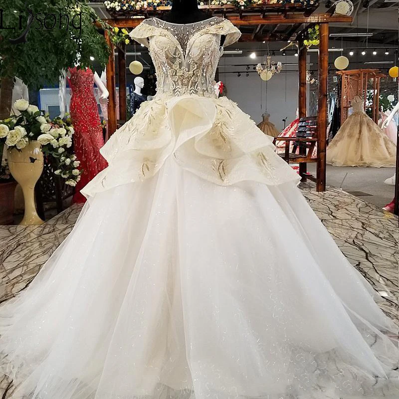 

2019 Luxury 3D Applique Lebanon Wedding Dresses Illusion Neckline Short Sleeve Lace Beaded Cascading Ruffles Garden Bridal Gowns