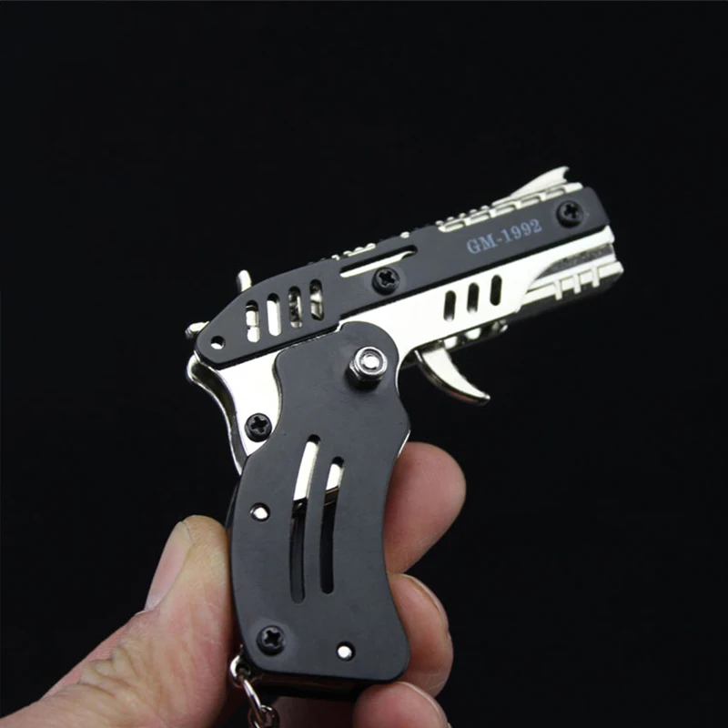 

Mini Cute Keychain for Men fold Gun Weapon Rubber Band Eight Burst Key Chain Rings for Kids Adults Car Keyring Metal Key Holder