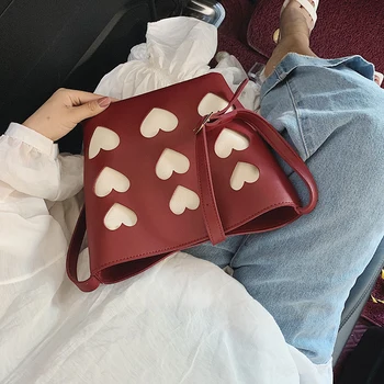 

Summer bag female 2020 style hollowed-out heart bucket bag large capacity with a cross-body bag