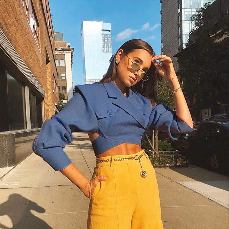 

Hot 2019 autumn England style new women's long-sleeved Notched solid color hollow short dew Back Lumbar Slim fit Wild t-shirt