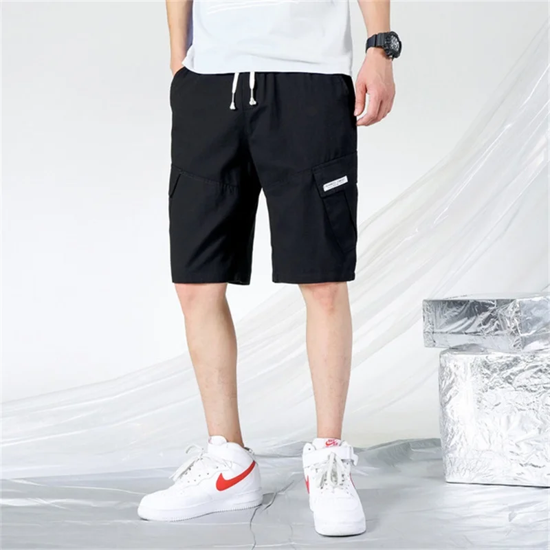 Новые мужские летние тонкие повседневные шорты Стрейчевые свободные укороченные брюки с несколькими карманами брендовые шорты