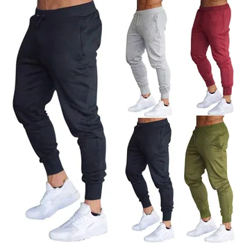 Nowe spodnie do joggingu męskie spodnie sportowe spodnie do biegania spodnie męskie biegaczy bawełniane spodnie do biegania dopasowane obcisłe spodnie kulturystyka spodnie tanie i dobre opinie CN (pochodzenie) Troczek POLIESTER Dobrze pasuje do rozmiaru wybierz swój normalny rozmiar Yoga Pełna długość yoga pants