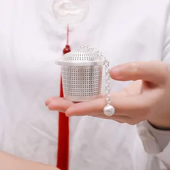 

Small sterling silver tea filter handmade foot silver 999 hollowed out tea strainer household sterling silver tea shelf