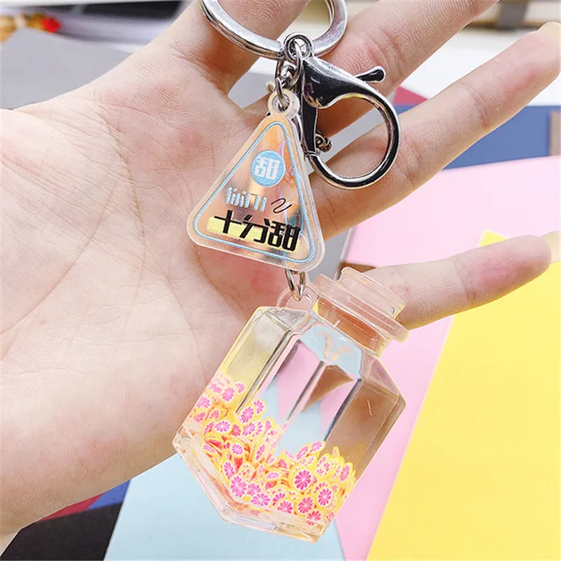 

Creative cute sequins acrylic Keychain Moving Liquid oil Drop decompression drift bottle Jewelry Best Gift