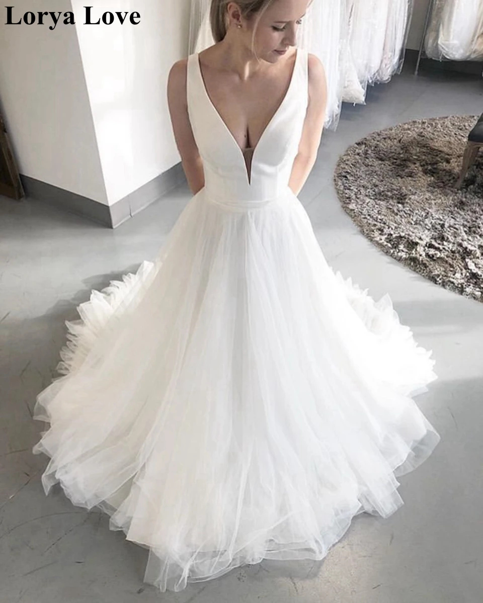 

2020 New Simple Wedding Dresses Boho A-Line White Ivory Sleeveless Beach Bridal Gowns Floor Length Sexy V-Neck Vestidos De Noiva