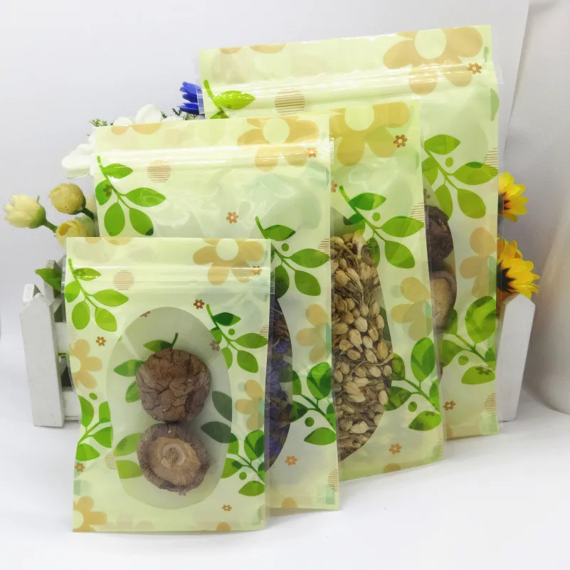 

Retail 14*20cm 5.51"x7.87" 100Pcs/Lot Tea Snack Clear Ziplock Packaging Bags Green Leaf Heat Seal Plastic Valve Resealable Bag