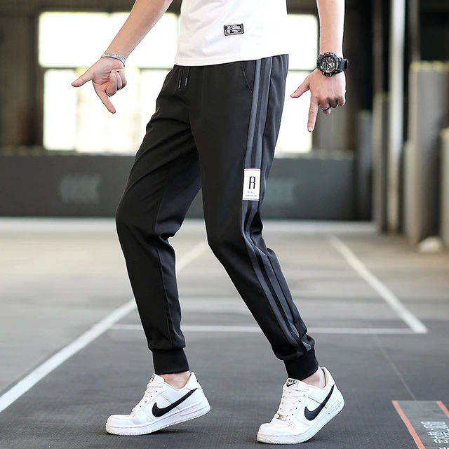 Pantalones deportivos transpirables para hombre, pantalón informal de color  negro, ajustado, para correr, ropa de verano, M-4XL - AliExpress