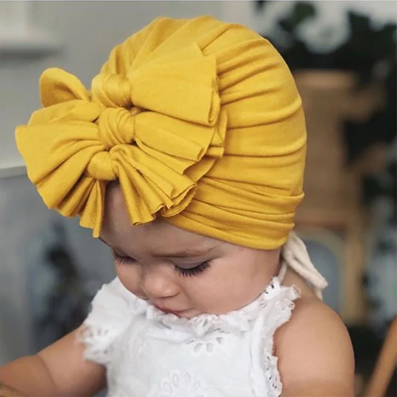 

Cotton Newborn Solid Color Pleated Hat BeBes Twist Turban Bow Knot Baby Girls Cap Hat Unisex Cotton Soft Head Hoop Infant Beanie