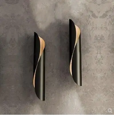 

Redacted version of Milan's new calla egg roll personality luxury wall lamp LED wrought iron wall lamp