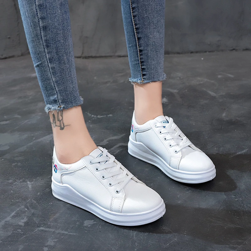 white stylish trainers