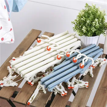 

Plastic Foldable Clothes Hanger with 29 Clips Windproof Socks Clothespin Pegs Telescopic Drying Rack Retaining Beach Towel Clip