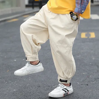 

Children's trousers 2020 spring new Korean version of the boy's big boy's short version of the trousers velcro overalls tide