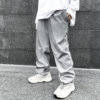 

Jogger Sweatpants Men Reflective Material Casual Pant Male Streetwear Hip Hop Loose Trousers Elastic Waist Pants