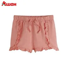 Шорты персиковые с рюшами In Extenso