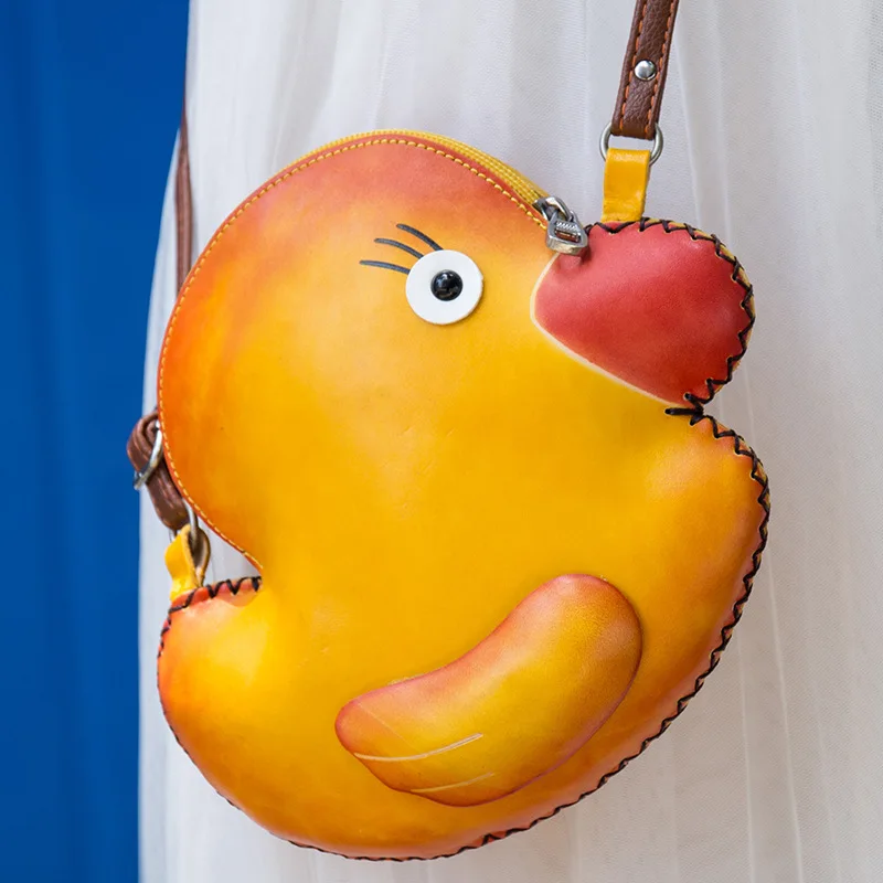 

Big Yellow Duck Shoulder Bag First Layer Cattle Pippi Tanned Leather Material Cartoon Key Button Shoulder Bag
