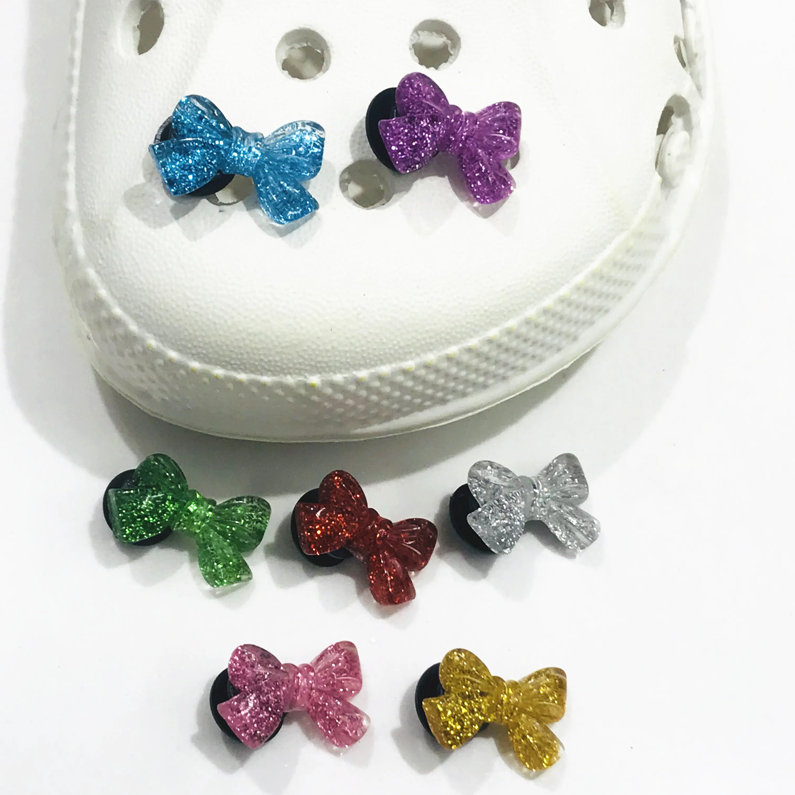 

Wholesale 7Pcs Cartoon Bowknot Bow-tie Resin Shoe Charms Accessories Shoes Buckle DIY Backpack Wristbands Shoes