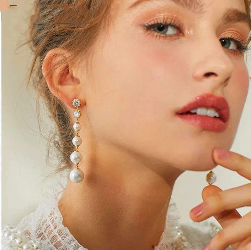 

2019 New S925 Silver Needle Creative Earrings Female Imitation Pearl Stud Earrings Simple Fringe Earrings Jewelry Long Pearl