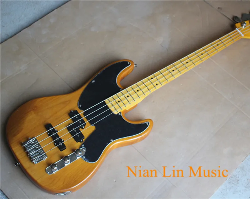 

4-String Bass Guitar,Vintage Yellow Color,Alder wood Body,Maple Fingerboard,Black Pickgaurd and can be Customized