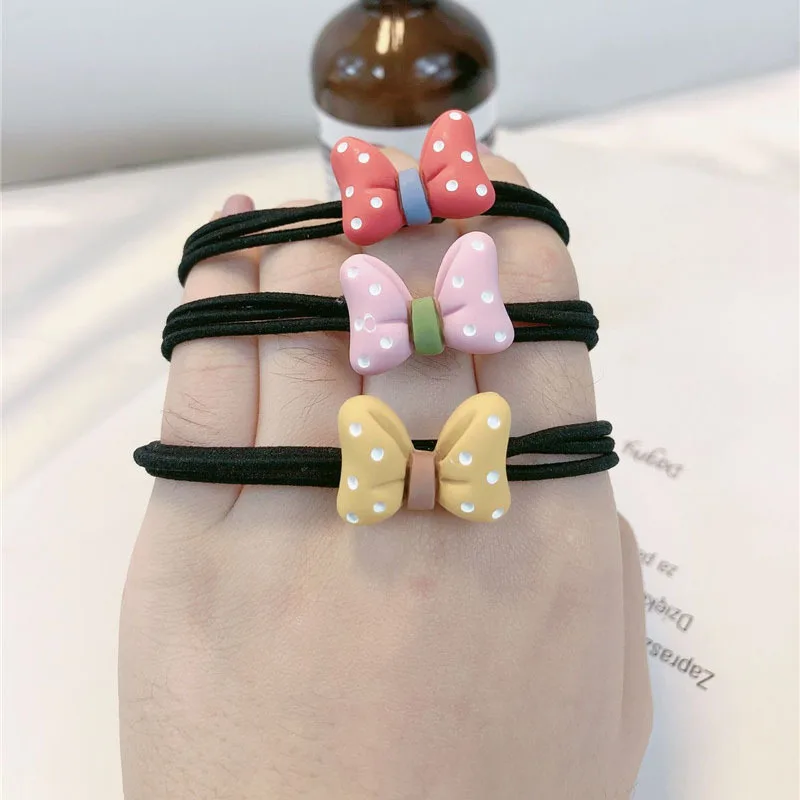 US $189.00 500pcslot DIY Simple Multi Acrylic Bowknot Wave Point Rubber Band Elasticity Baby Hair Bands Styling Tool Accessory HA1680