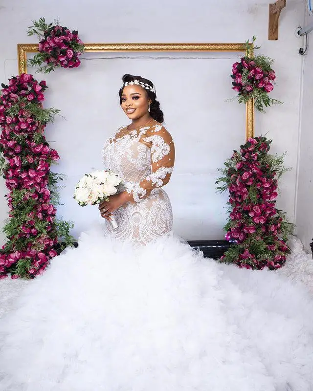 

Plus Size Illusion Long Sleeve Wedding Dresses 2021 Sexy African Nigerian Jewel Neck Lace-up Back Mermaid Applique Bride Gowns