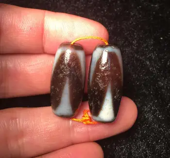 

A pair of Magic Tibetan Old Agate Oily Sharp Tiger Tooth Totem dZi Bead Amulet
