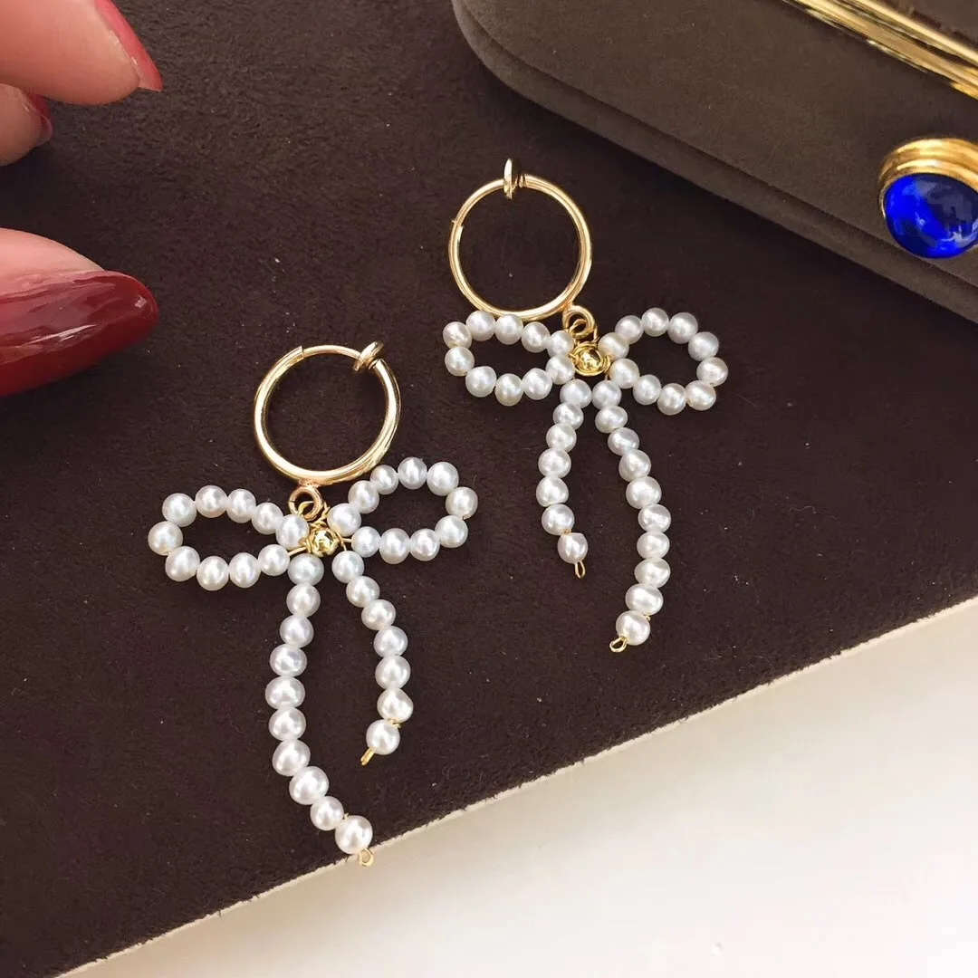 

Butterfly Home 14k Gold New Style Sweet Bow Clip-on White 2-3 near round Glare Virgine Pearl Ear Stud
