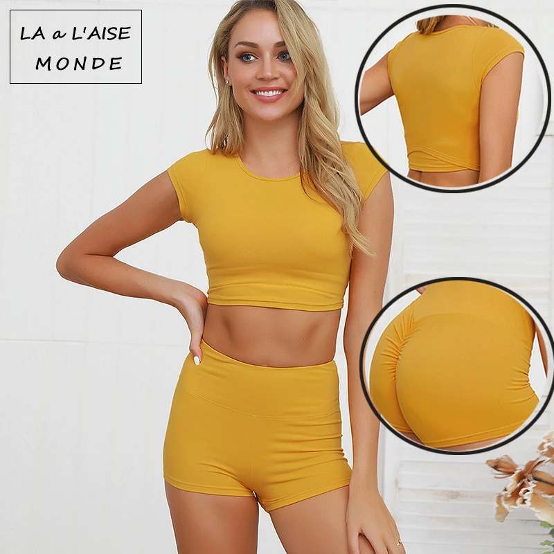 

Women's Sportswear Yoga Fitness Moisture Wicking Sports Suit Running Quick Drying Solid Color Short Sleeved Yoga Set 2 Pieces