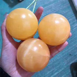 Wholesale Polished Golden Frozen Healing Crystals Ball Natural Orange Calcite Crystal Spheres For Sale