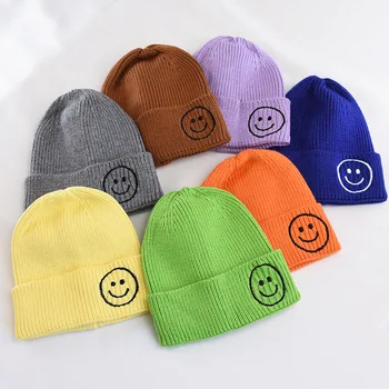

New Baby melon cap children's wool hat autumn and winter boys and girls candy color earmuffs warm smile knit hat kids beanies