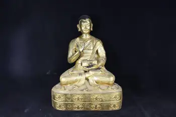 

wedding decoration Old Chinese collection of brass gilt Tibetan Buddhist statues Sitting on a statue holding a magical instrumen
