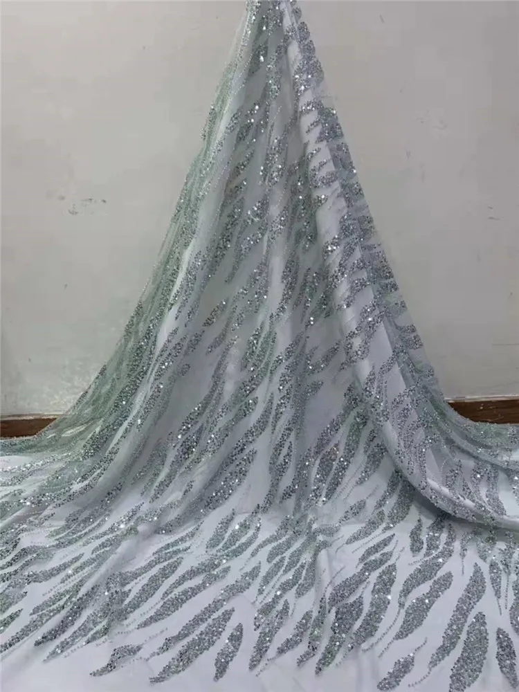 

High quality beads sequins embroidered French mesh gauze exquisite African lace Nigerian lace suitable for design wedding dress