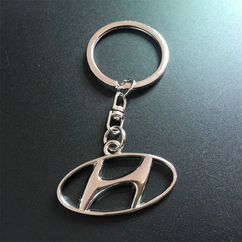 

Car logo keychain zinc alloy hollow long chain double-sided design keychain for Hyundai car gift pendant to send a good gift to friends and relatives