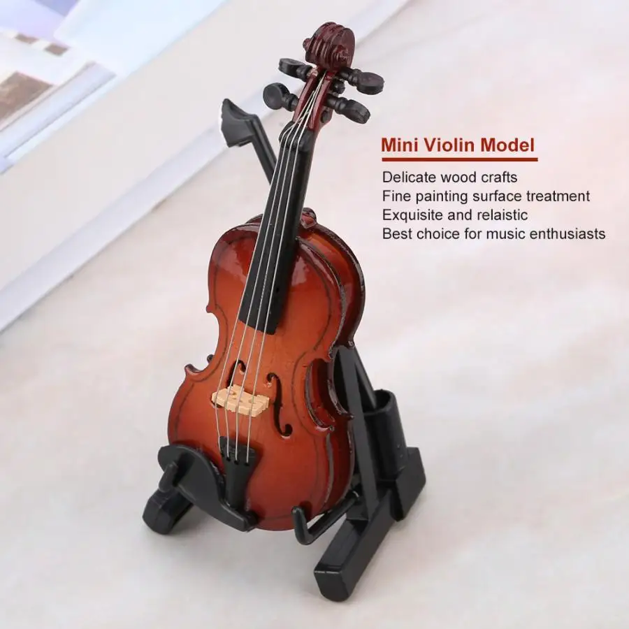 Violín violín miniatura con el arco y la caja para la decoración en el estilo