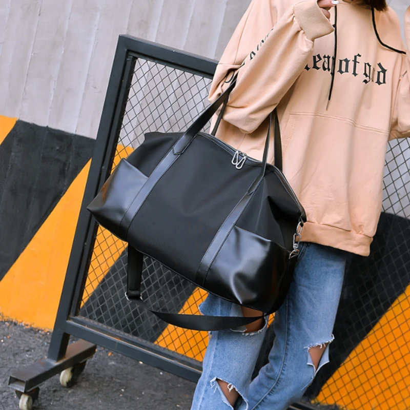 

Large sports bag men and women training fitness bag waterproof folding travel bag durable multifunctional travel handbag