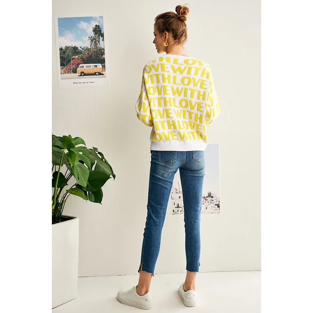 Jacquard sweater with yellow love letters