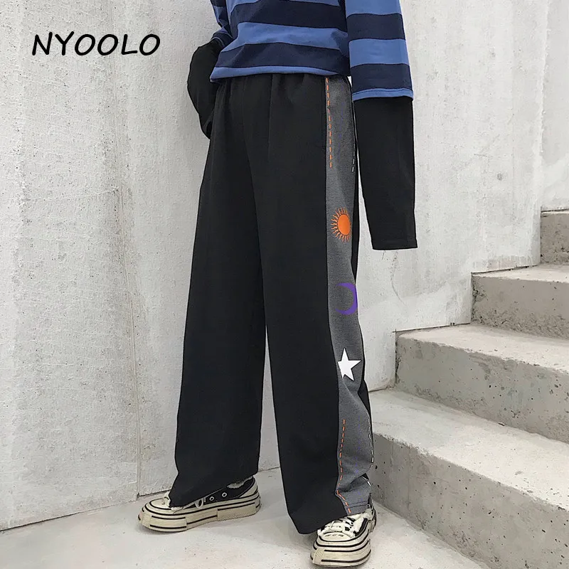 NYOOLO Harajuku дизайн Звезды Луна солнце печати лоскутное свободные брюки осень уличная эластичная талия прямые брюки женские мужские