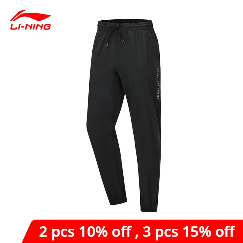 Мужские спортивные брюки Li-Ning Стрейчевые штаны из 86% полиэстера с карманами и