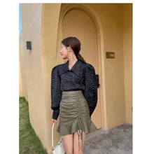 Autumn and winter new Korean style design sense pleated skirt lotus leaf skirt high waist Western style thin PU leather skirt