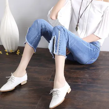 

The new female jeans han edition thin section tassel nine points jeans elastic thin burrs split micro flared trousers W1002