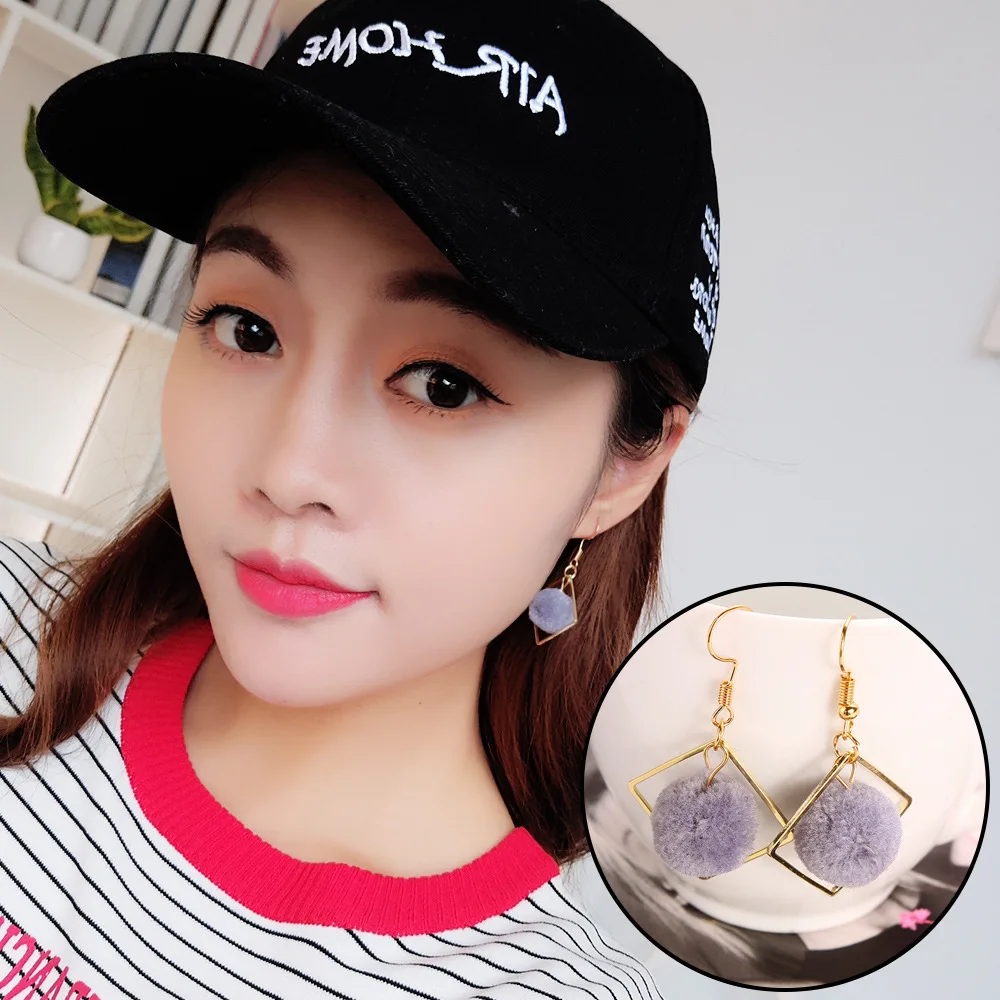 

Sweet and simple net red with khaki geometric hair ball earrings