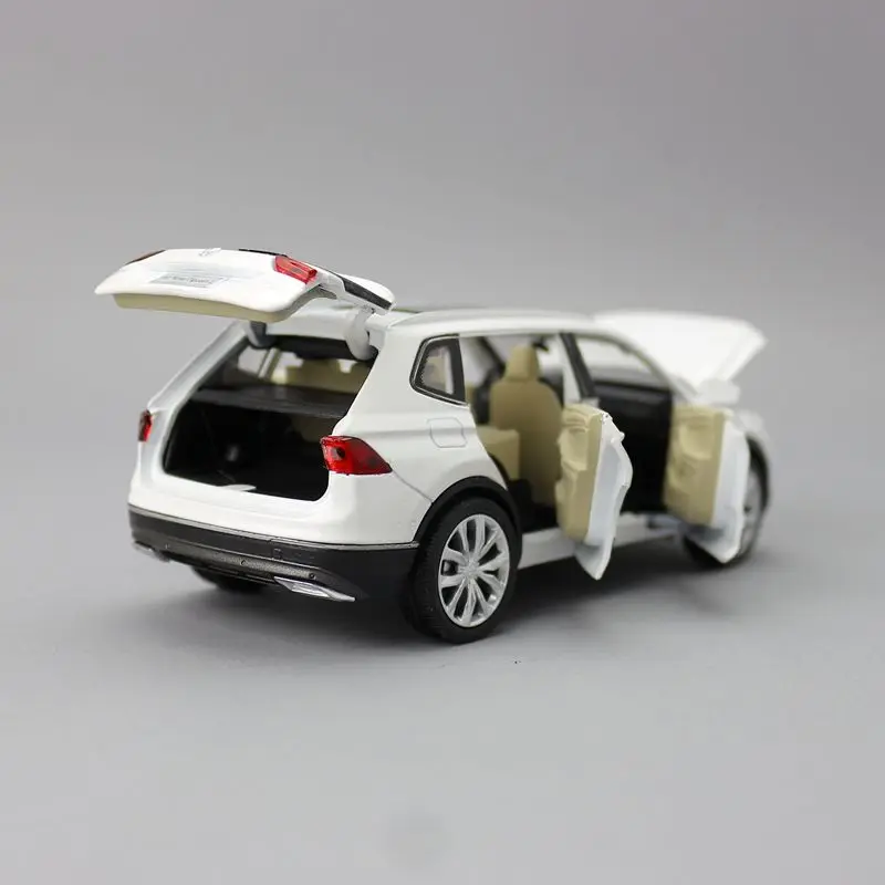 Масштаб 1:32/литая металлическая игрушка/внедорожник Volkswagen Tiguan спортивный