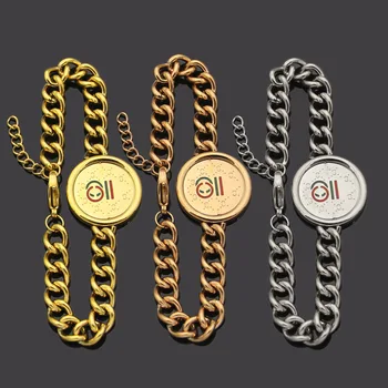 

Titanium steel jewelry wholesale G letter red green oil drop stripe grid wide face women's Bracelet